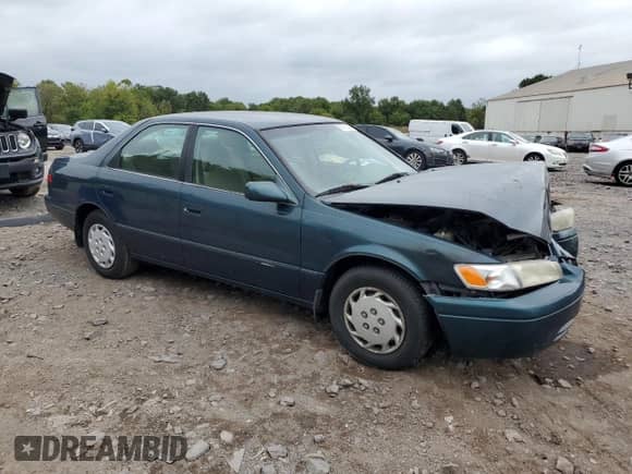 1997 Toyota Camry LE с VIN 4T1BG22K2VU069055, выставлен на аукционе Copart как лот 80131065 с пробегом 193 934 миль миль и Списание • Salvage title. История ставок и продаж доступна на DreamBid. Изображение 4.