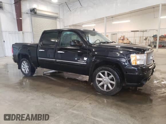 2010 GMC Sierra 1500 Denali z VIN 3GTRKXE28AG259921, wystawiony jako Copart lot #73592214 z przebiegiem 156 378 mil mil oraz Szkoda całkowita • Salvage title. Historia ofert i sprzedaży dostępna na DreamBid. Obrazek 4.