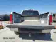 2010 GMC Sierra 1500 with VIN 1GTSCWE04AZ221013, listed as a Copart auction lot 46502985 with 232,338 mi miles and Salvage title. Bid and sale history available at DreamBid. Image 6.