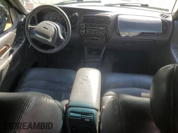 2000 Ford Explorer Limited with VIN 1FMDU75E9YUB50157, listed as a Copart auction lot 88743875 with 184,376 mi miles and Salvage title. Bid and sale history available at DreamBid. Image 8.