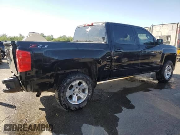 2018 Chevrolet Silverado 1500 LT z VIN 3GCUKREC3JG516403, wystawiony jako Copart lot #82135815 z przebiegiem 138 927 mil mil oraz Szkoda całkowita • Salvage title. Historia ofert i sprzedaży dostępna na DreamBid. Obrazek 3.