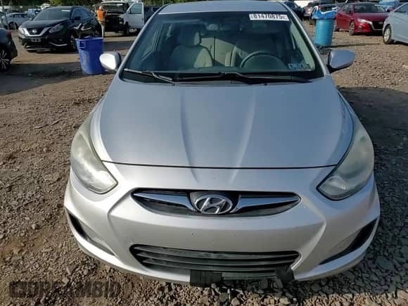 2012 Hyundai Accent GLS z VIN KMHCT4AE0CU223153, wystawiony jako Copart lot #81470875 z przebiegiem 177 258 mil mil oraz Szkoda całkowita • Salvage title. Historia ofert i sprzedaży dostępna na DreamBid. Obrazek 13.