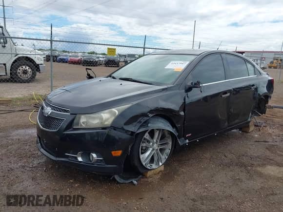 2014 Chevrolet Cruze LTZ with VIN 1G1PG5SB4E7168057, listed as a IAAI auction lot 43437947 with 145,021 mi miles and . Bid and sale history available at DreamBid. Image 2.