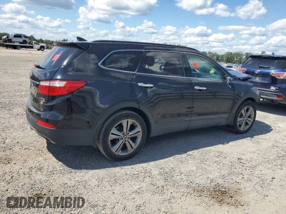 2015 Hyundai Santa Fe Limited с VIN KM8SRDHFXFU091581, выставлен на аукционе Copart как лот 70541585 с пробегом Не указан миль и Списание • Salvage title. История ставок и продаж доступна на DreamBid. Изображение 3.