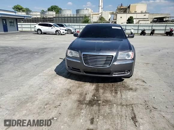 2013 Chrysler 300 с VIN 2C3CCARG4DH519570, выставлен на аукционе Copart как лот 84562275 с пробегом 185 985 миль миль и Списание • Salvage title. История ставок и продаж доступна на DreamBid. Изображение 13.