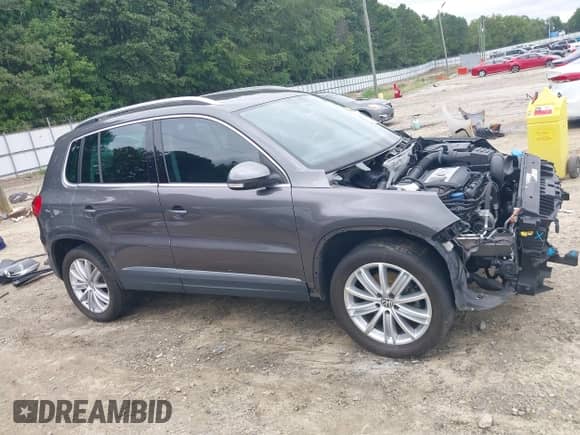 2012 Volkswagen Tiguan S с VIN WVGAV7AX2CW005790, выставлен на аукционе IAAI как лот 42942132 с пробегом 80 424 миль миль и . История ставок и продаж доступна на DreamBid. Изображение 14.