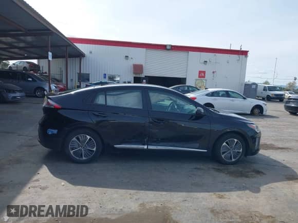 2021 Hyundai Ioniq SE with VIN KMHC65LD3MU249765, listed as a IAAI auction lot 41986977 with 63,363 mi miles and . Bid and sale history available at DreamBid. Image 14.