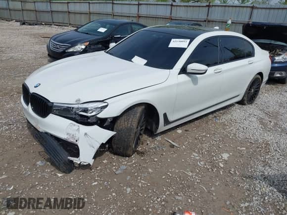 2019 BMW 7 Series 740i xDrive with VIN WBA7E4C54KGV28548, listed as a IAAI auction lot 42130093 with 92,126 mi miles and . Bid and sale history available at DreamBid. Image 2.