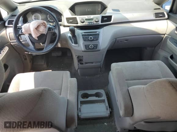 2016 Honda Odyssey LX with VIN 5FNRL5H20GB063404, listed as a Copart auction lot 60448065 with 89,044 mi miles and Salvage title. Bid and sale history available at DreamBid. Image 8.