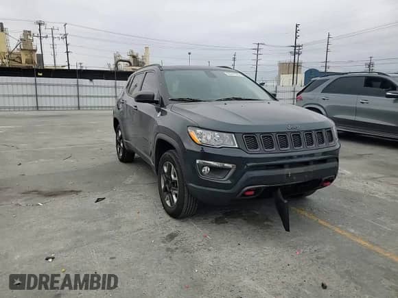 2017 Jeep Compass Trailhawk with VIN 3C4NJDDB0HT659636, listed as a Copart auction lot 62021725 with 34,092 mi miles and Salvage title. Bid and sale history available at DreamBid. Image 14.