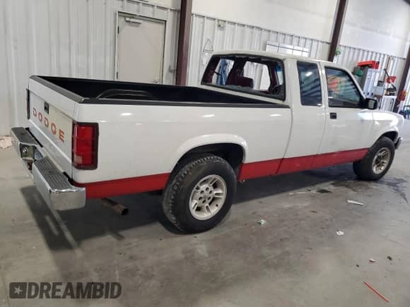 1993 Dodge Dakota z VIN 1B7FL23X3PS180403, wystawiony jako Copart lot #46158805 z przebiegiem Nie podano mil oraz Szkoda całkowita • Salvage title. Historia ofert i sprzedaży dostępna na DreamBid. Obrazek 3.