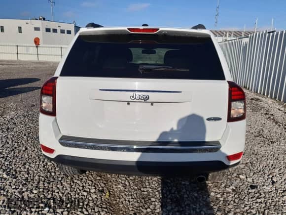 2017 Jeep Compass Latitude with VIN 1C4NJCEA9HD130529, listed as a Copart auction lot 52049285 with 82,338 mi miles and Salvage title. Bid and sale history available at DreamBid. Image 6.