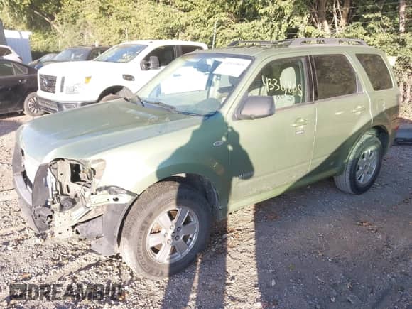 2008 Mercury Mariner with VIN 4M2CU91Z28KJ30312, listed as a IAAI auction lot 43361805 with 218,042 mi miles and . Bid and sale history available at DreamBid. Image 2.