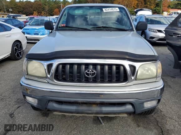 2003 Toyota Tacoma z VIN 5TEWN72N93Z264464, wystawiony jako Copart lot #82414875 z przebiegiem 231 483 mil mil oraz Czysty tytuł • Clean title. Historia ofert i sprzedaży dostępna na DreamBid. Obrazek 5.