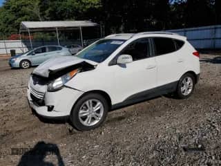 2013 Hyundai Tucson Limited с VIN KM8JU3AC5DU619836, выставлен на аукционе Copart как лот 66644605 с пробегом 125 768 миль миль и Списание • Salvage title. История ставок и продаж доступна на DreamBid. Изображение 1.