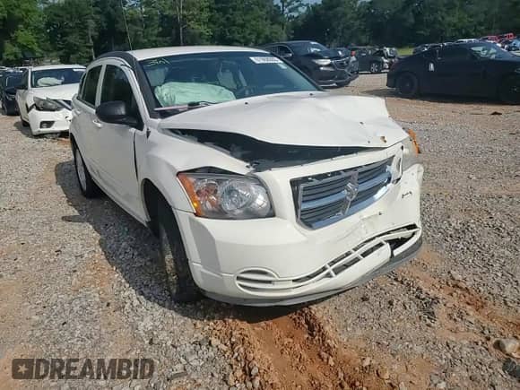 2009 Dodge Caliber SXT with VIN 1B3HB48A89D224125, listed as a Copart auction lot 61968005 with 241,959 mi miles and Salvage title. Bid and sale history available at DreamBid. Image 13.