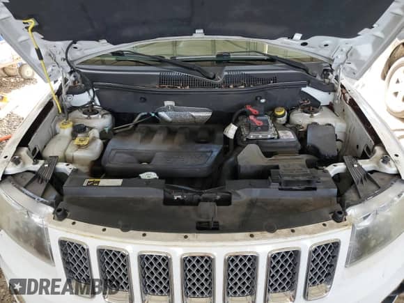 2014 Jeep Compass Latitude with VIN 1C4NJCEB9ED826084, listed as a Copart auction lot 72266434 with 103,718 mi miles and Salvage title. Bid and sale history available at DreamBid. Image 12.