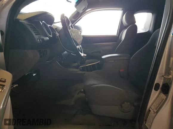 2006 Toyota Tacoma с VIN 5TEUU42N36Z306530, выставлен на аукционе Copart как лот 82293625 с пробегом 220 562 миль миль и Списание • Salvage title. История ставок и продаж доступна на DreamBid. Изображение 7.