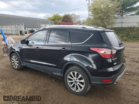 2017 Ford Escape Titanium с VIN 1FMCU0JD9HUE22755, выставлен на аукционе Copart как лот 87491745 с пробегом 158 322 миль миль и Чистый • Clean title. История ставок и продаж доступна на DreamBid. Изображение 2.