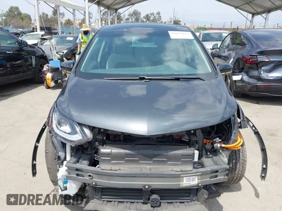 2021 Chevrolet Bolt EV LT with VIN 1G1FY6S05M4112478, listed as a IAAI auction lot 42059631 with 37,485 mi miles and . Bid and sale history available at DreamBid. Image 13.