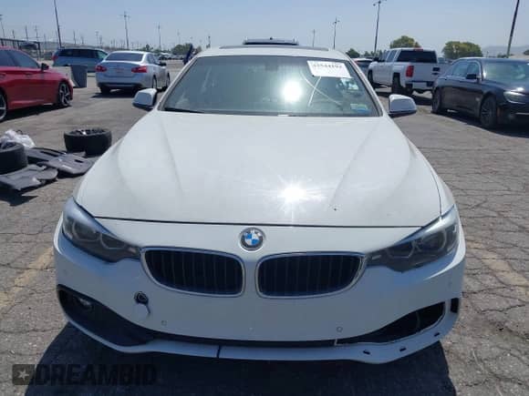 2018 BMW 4 Series 430i with VIN WBA4J1C59JBG77615, listed as a IAAI auction lot 42544193 with 58,445 mi miles and . Bid and sale history available at DreamBid. Image 13.