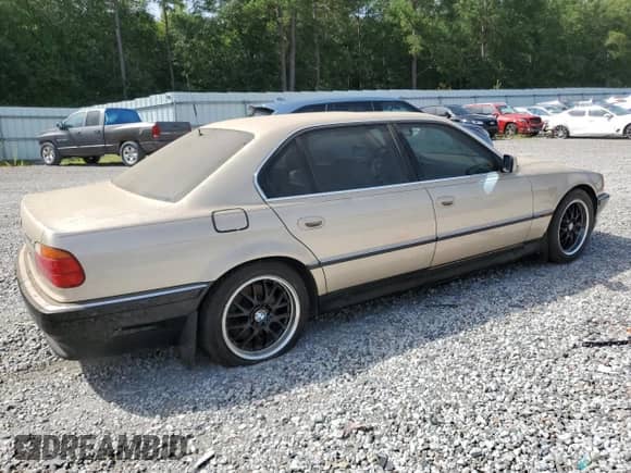 1998 BMW 7 Series 740iL with VIN WBAGJ8323WDM24309, listed as a Copart auction lot 65705964 with 206,422 mi miles and Clean title. Bid and sale history available at DreamBid. Image 3.