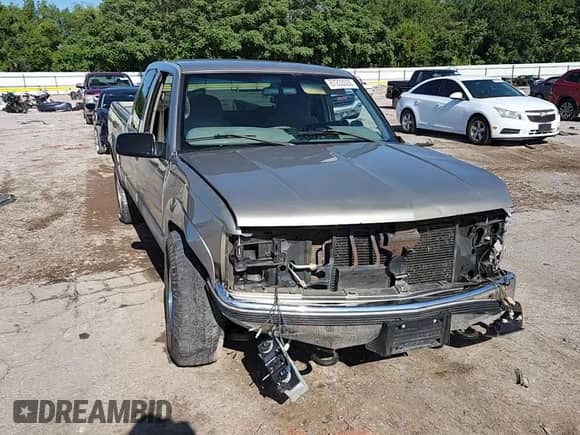 1999 Chevrolet Silverado 2500 with VIN 1GCGK29R4XF051160, listed as a Copart auction lot 67233005 with 226,759 mi miles and Salvage title. Bid and sale history available at DreamBid. Image 13.
