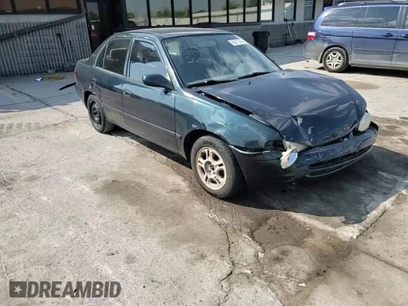 1998 Chevrolet Prizm with VIN 1Y1SK528XWZ425955, listed as a Copart auction lot 69211474 with 124,133 mi miles and Salvage title. Bid and sale history available at DreamBid. Image 11.