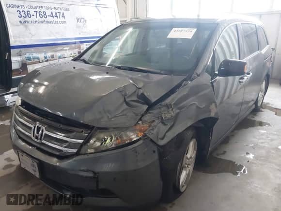 2012 Honda Odyssey Touring с VIN 5FNRL5H92CB106325, выставлен на аукционе IAAI как лот 43287538 с пробегом 206 962 миль миль и . История ставок и продаж доступна на DreamBid. Изображение 2.