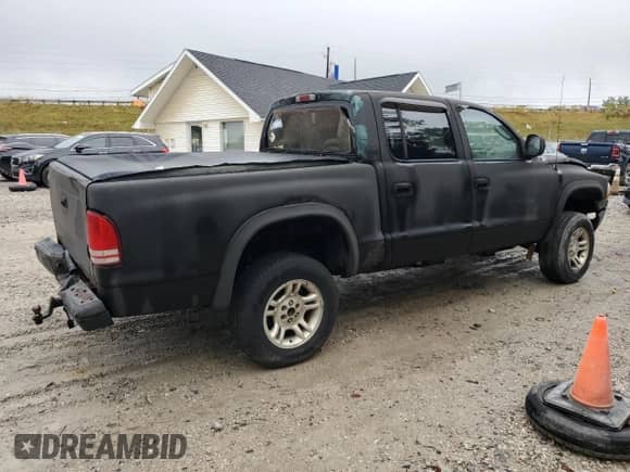 2000 Dodge Dakota Sport z VIN 1B7GG2AN0YS779786, wystawiony jako Copart lot #81118925 z przebiegiem 125 684 mil mil oraz Szkoda całkowita • Salvage title. Historia ofert i sprzedaży dostępna na DreamBid. Obrazek 3.