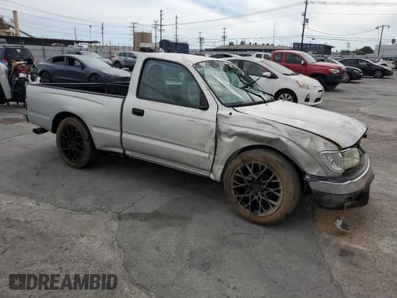 2002 Toyota Tacoma with VIN 5TENL42N82Z080549, listed as a Copart auction lot 80899715 with 115,239 mi miles and Salvage title. Bid and sale history available at DreamBid. Image 4.