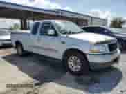 2002 Ford F-150 XL z VIN 1FTRX17W82NB59499, wystawiony jako Copart lot #85295365 z przebiegiem 191 328 mil mil oraz Szkoda całkowita • Salvage title. Historia ofert i sprzedaży dostępna na DreamBid. Obrazek 4.
