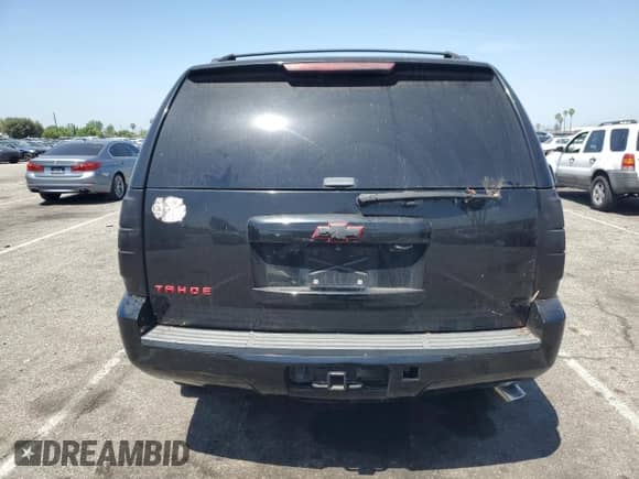2013 Chevrolet Tahoe LS with VIN 1GNSCAE0XDR359346, listed as a Copart auction lot 57363345 with 163,081 mi miles and Salvage title. Bid and sale history available at DreamBid. Image 6.