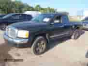 2005 Dodge Dakota with VIN 1D7HE52NX5S163668, listed as a IAAI auction lot 42865087 with 159,528 mi miles and . Bid and sale history available at DreamBid. Image 2.