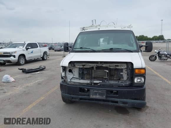 2012 Ford Econoline Cargo Recreational z VIN 1FTNE2EL6CDA07313, wystawiony jako IAAI lot #43181497 z przebiegiem 225 757 mil mil oraz . Historia ofert i sprzedaży dostępna na DreamBid. Obrazek 13.