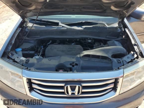 2014 Honda Pilot Touring with VIN 5FNYF3H94EB021903, listed as a Copart auction lot 71323565 with 96,054 mi miles and Salvage title. Bid and sale history available at DreamBid. Image 12.