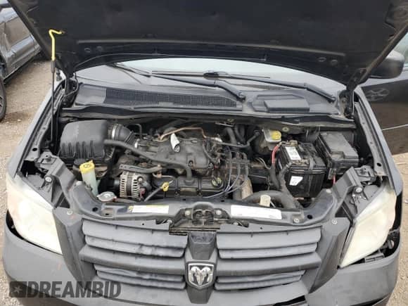 2010 Dodge Grand Caravan Hero z VIN 2D4RN3D14AR440343, wystawiony jako Copart lot #82374115 z przebiegiem 157 554 mil mil oraz Szkoda całkowita • Salvage title. Historia ofert i sprzedaży dostępna na DreamBid. Obrazek 11.