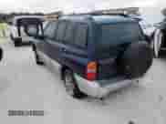 2002 Chevrolet Tracker LT с VIN 2CNBE634126928532, выставлен на аукционе Copart как лот 76990704 с пробегом Не указан миль и Списание • Salvage title. История ставок и продаж доступна на DreamBid. Изображение 2.