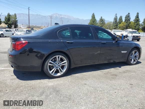 2013 BMW 7 Series 740Li with VIN WBAYE4C51DDW22542, listed as a Copart auction lot 66665525 with 103,343 mi miles and Salvage title. Bid and sale history available at DreamBid. Image 3.
