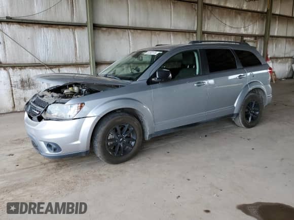 2019 Dodge Journey SE with VIN 3C4PDCBB0KT867455, listed as a Copart auction lot 81263115 with 116,741 mi miles and Salvage title. Bid and sale history available at DreamBid. Image 1.