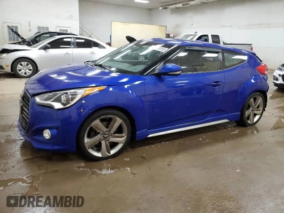 2013 Hyundai Veloster Turbo с VIN KMHTC6AE1DU120157, выставлен на аукционе Copart как лот 64289055 с пробегом 144 651 миль миль и Чистый • Clean title. История ставок и продаж доступна на DreamBid. Изображение 1.