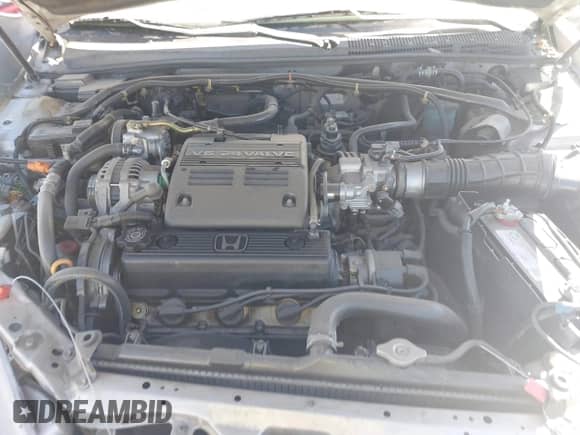 1996 Honda Accord EX z VIN 1HGCE667XTA019483, wystawiony jako IAAI lot #39625724 z przebiegiem 211 631 mil mil oraz . Historia ofert i sprzedaży dostępna na DreamBid. Obrazek 10.