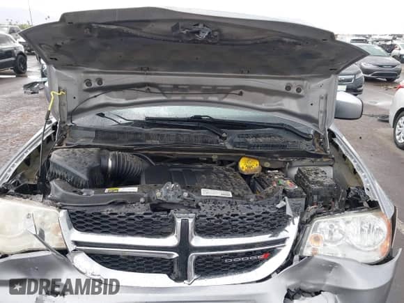2014 Dodge Grand Caravan SXT z VIN 2C4RDGCG6ER391309, wystawiony jako IAAI lot #43313620 z przebiegiem 136 074 mil mil oraz . Historia ofert i sprzedaży dostępna na DreamBid. Obrazek 10.