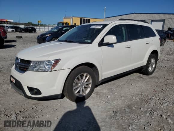 2015 Dodge Journey SXT with VIN 3C4PDCBGXFT637200, listed as a Copart auction lot 57106525 with 138,142 mi miles and Salvage title. Bid and sale history available at DreamBid. Image 1.