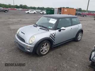 2006 MINI Hardtop S with VIN WMWRE33556TJ37120, listed as a IAAI auction lot 42601923 with 51,501 mi miles and . Bid and sale history available at DreamBid. Image 2.