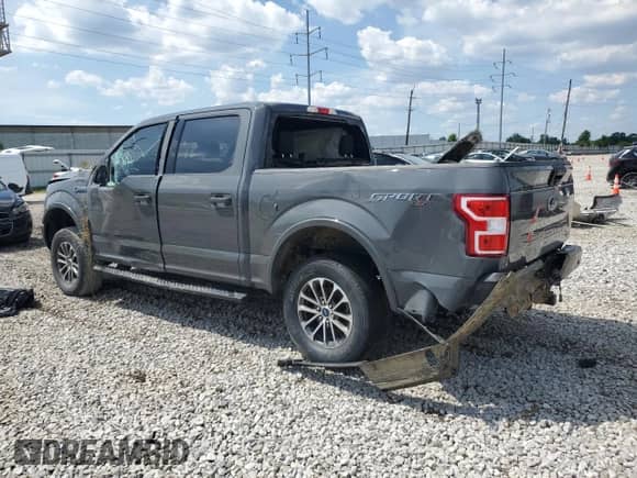 2020 Ford F-150 XL with VIN 1FTEW1EP9LFC64870, listed as a Copart auction lot 63343945 with 102,024 mi miles and Salvage title. Bid and sale history available at DreamBid. Image 2.