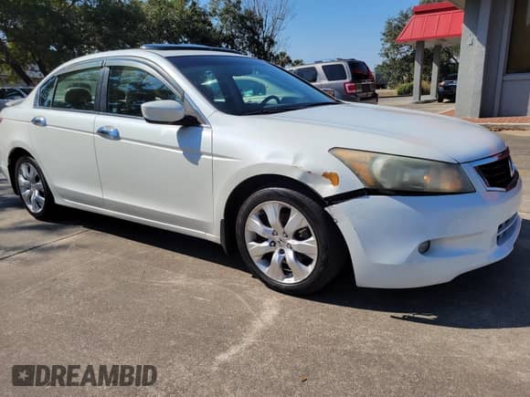 2009 Honda Accord EX-L with VIN 1HGCP36849A044437, listed as a IAAI auction lot 41705876 with 228,180 mi miles and . Bid and sale history available at DreamBid. Image 2.