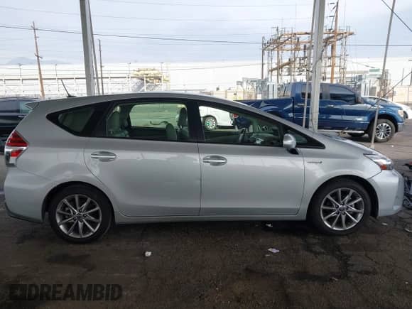 2015 Toyota Prius Two z VIN JTDZN3EU0FJ025828, wystawiony jako IAAI lot #41180043 z przebiegiem 36 036 mil mil oraz . Historia ofert i sprzedaży dostępna na DreamBid. Obrazek 13.