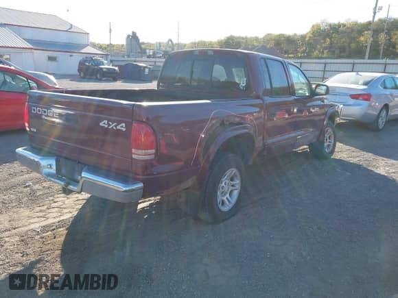 2002 Dodge Dakota SLT with VIN 1B7HG48N82S552357, listed as a IAAI auction lot 43498260 with 192,220 mi miles and . Bid and sale history available at DreamBid. Image 4.