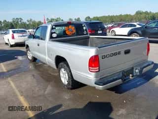 2001 Dodge Dakota with VIN 1B7GL22X21S121968, listed as a IAAI auction lot 43317250 with 163,485 mi miles and . Bid and sale history available at DreamBid. Image 3.
